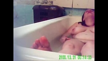 hidden cam. my horny mum fingering in bath tube