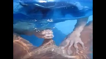 nasty wife give husband handjob in pool underwater.