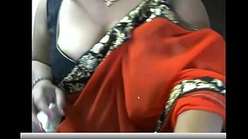 indian hot aunty pressing and showing her boobs.