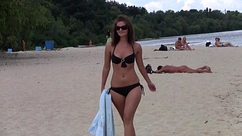 this teen nudist strips bare at a public beach