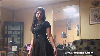 indian wife in bedroom dancing for hubby to.
