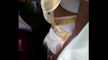girl showing her navel in bus.