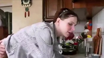 A talkative wife sucks cock and fucks in the kitchen