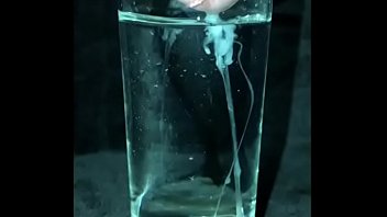 cumshot in a glass of water