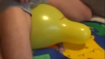 popping balloons while sit on it and pop.