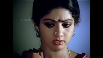 sridevi gorgeous actressremoving her blouse and showing her bra.
