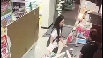 girl pissing in mart and drinking.